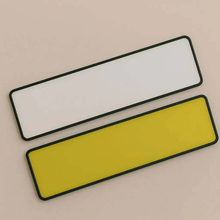 Load image into Gallery viewer, Thick Border Add-On for Number Plates - Bold Frame UK in white and yellow colors.